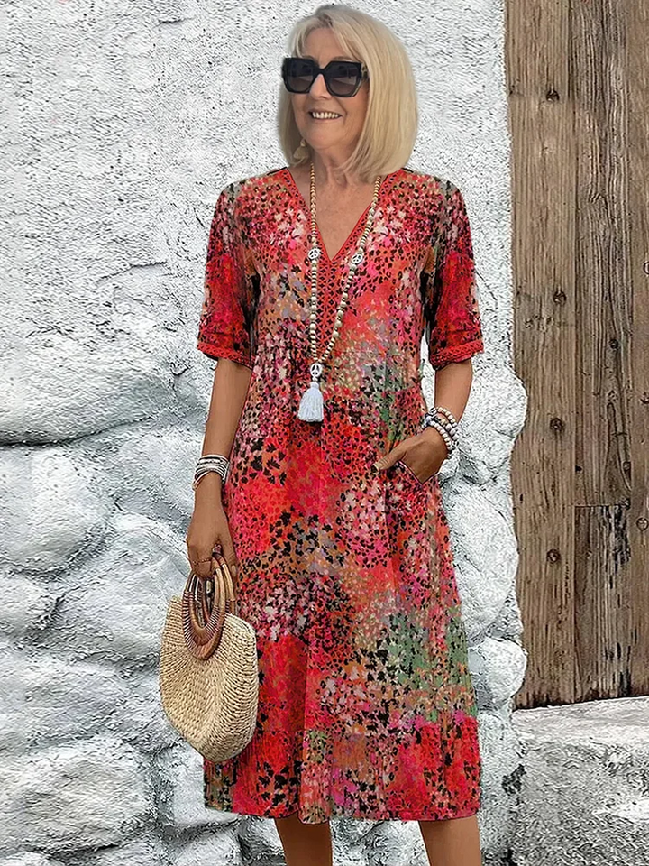 Elara – Elegantní vzorované midi šaty